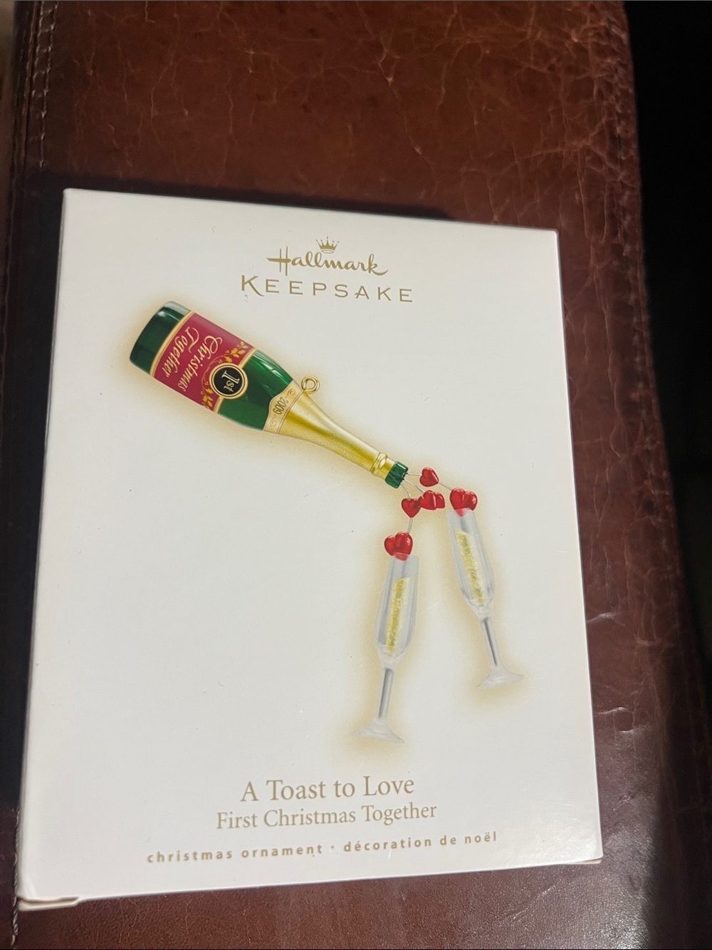 Hallmark 2009  Keepsake Champagne Bottle Ornament in Green, Gold & Red NWT